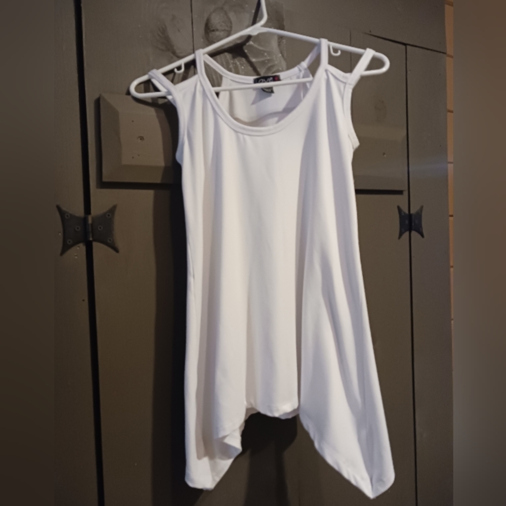 White tank with double strap detail and high low hem